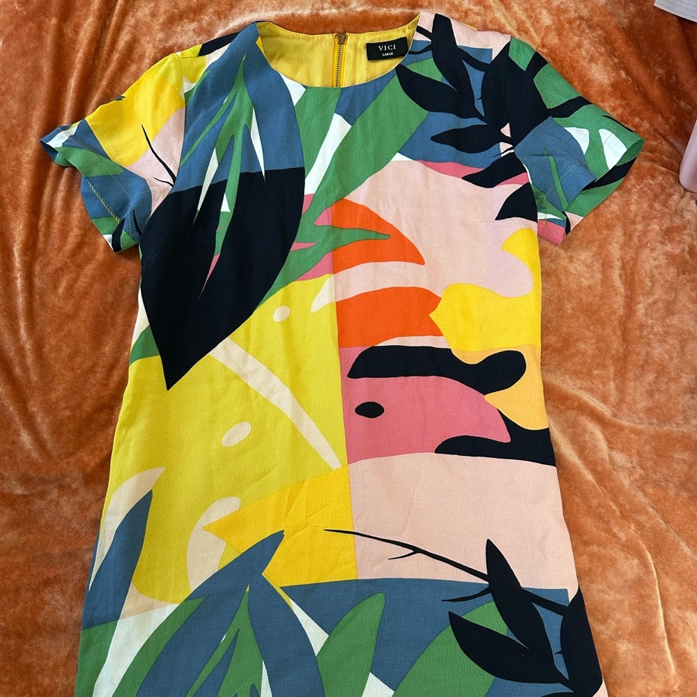 Floral knee length Vici Doll dress with back zipper.